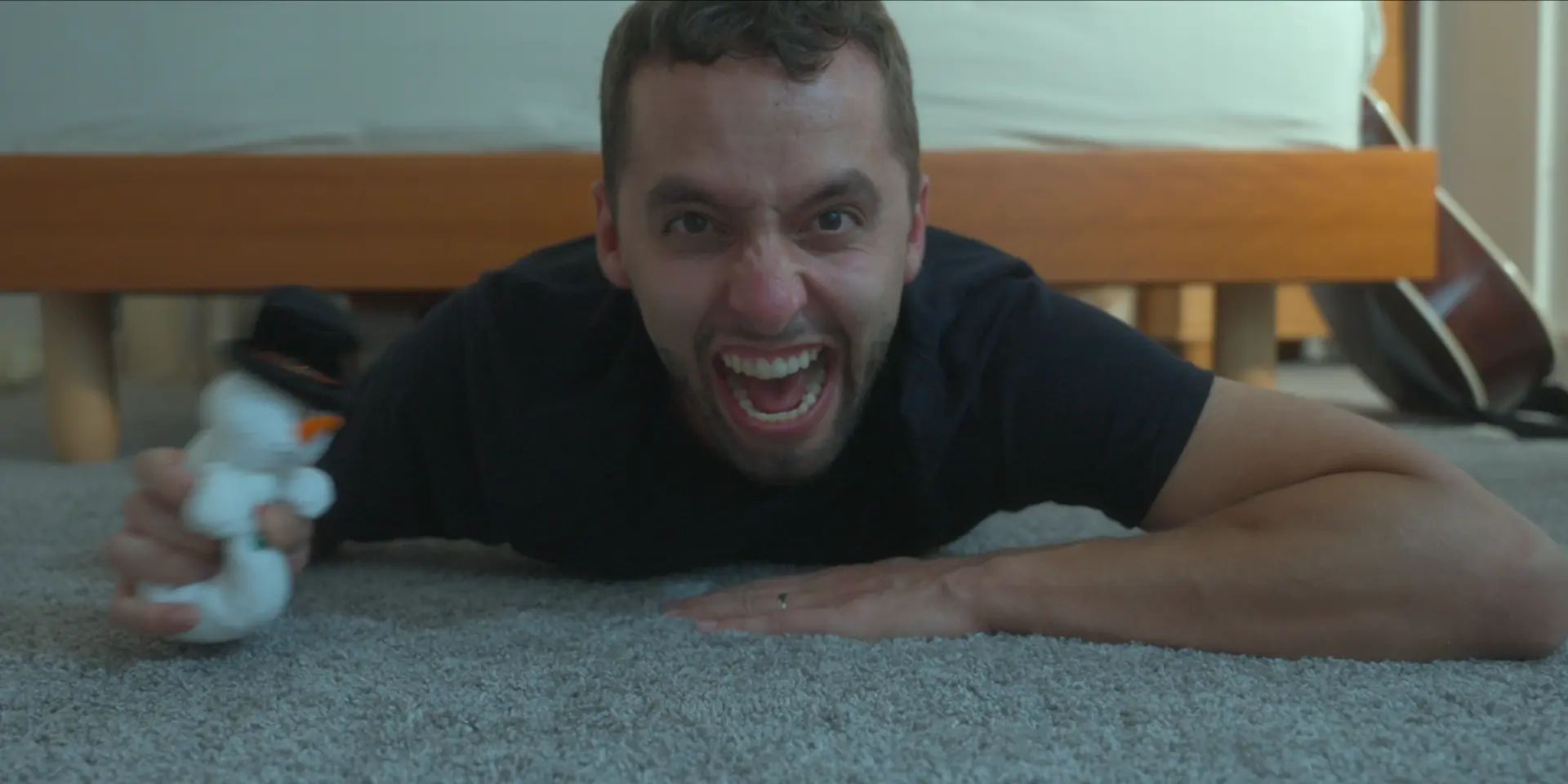 Ben screaming on the bedroom floor